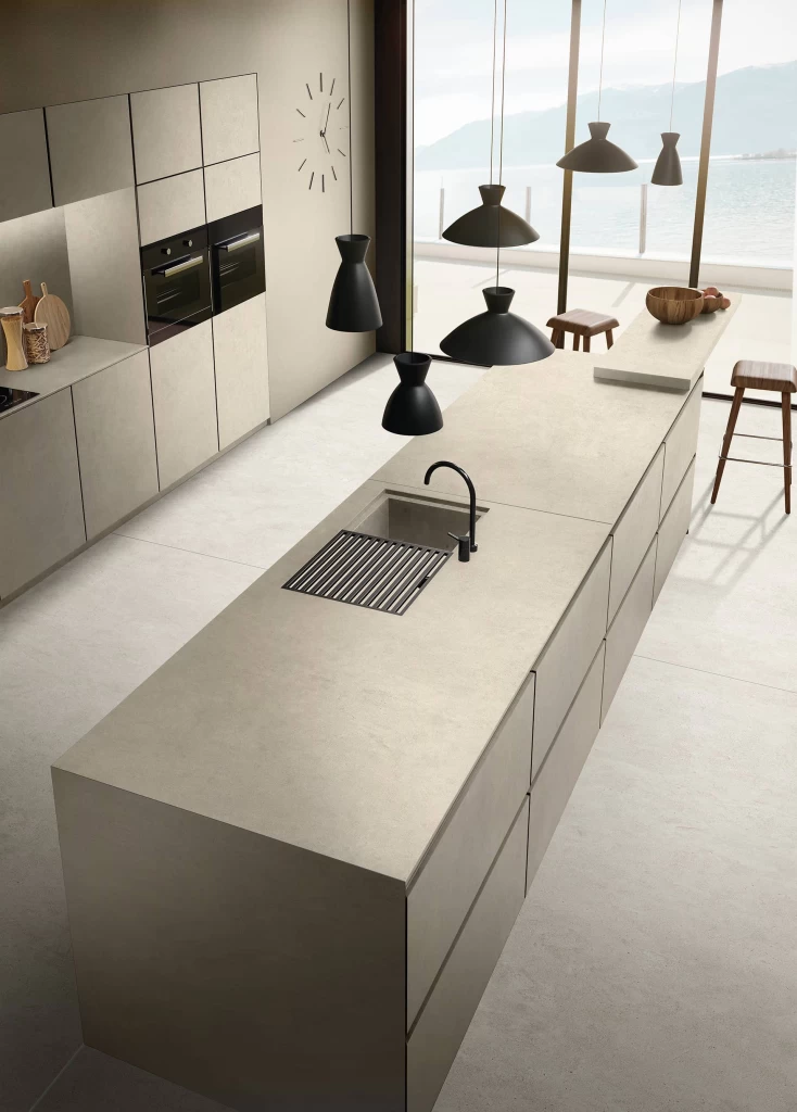 Top-down view of the kitchen island clad in Boost Vision Camel, showcasing a minimalist design with clean, linear surfaces.