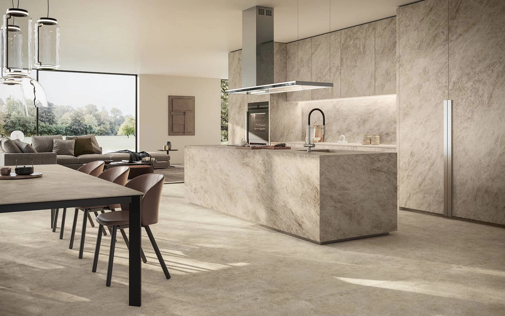 Modern kitchen with a central island clad in Taj Mahal Noisette marble-effect porcelain stoneware by Atlas Plan.
