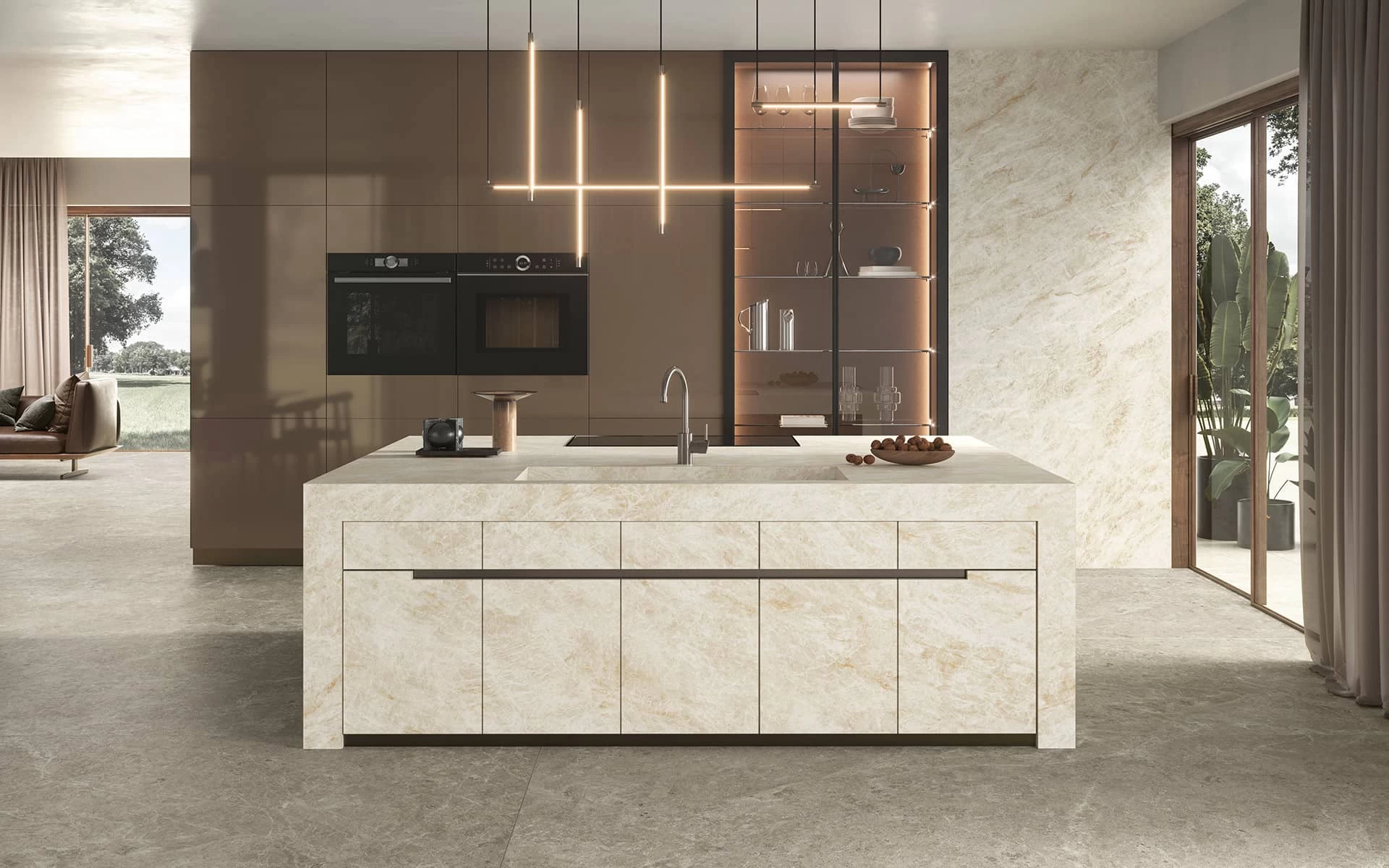 Kitchen island in Atlas Plan Taj Mahal White marble-effect porcelain stoneware with golden veining and modern moka-toned cabinetry.