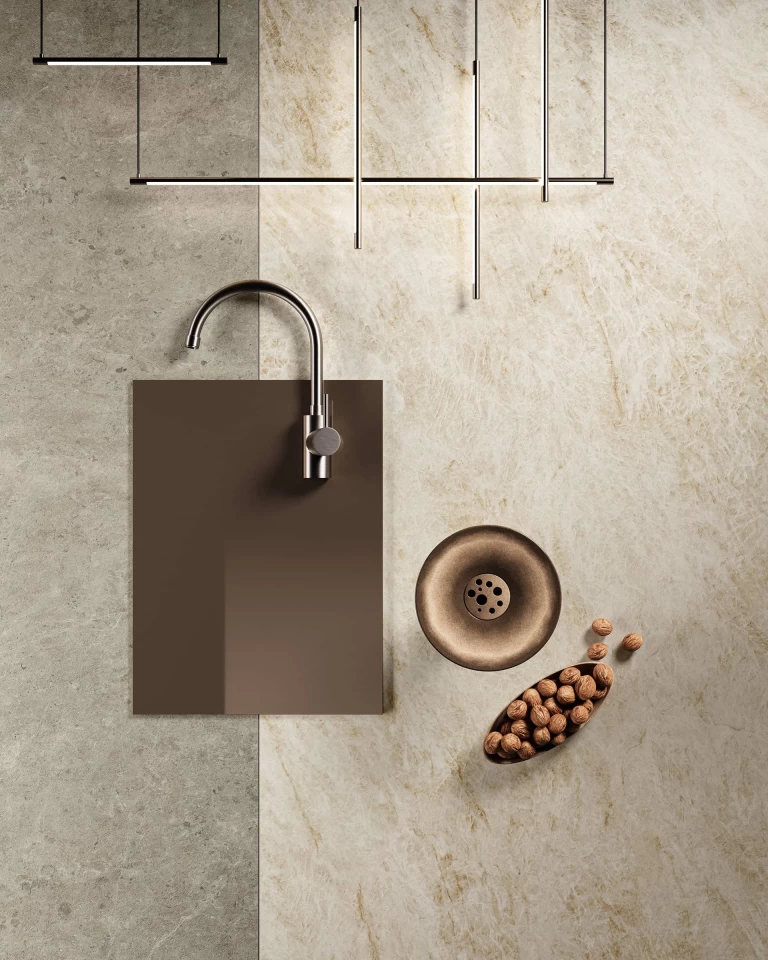 Zenith view of the Taj Mahal White porcelain worktop paired with grey stoneware and natural wooden accessories.
