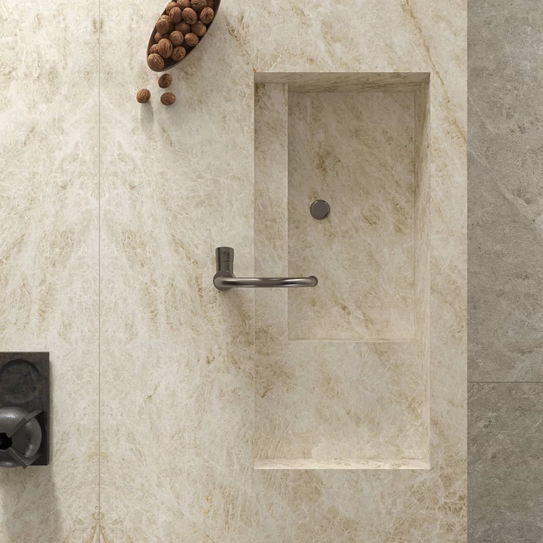 Detail of the integrated sink in the Atlas Plan Taj Mahal White worktop, featuring golden veining and contemporary taps.