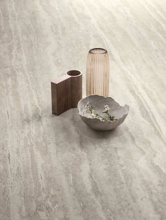 Close-up of the Travertino Romano Silver surface with elegant veining and decorative elements.