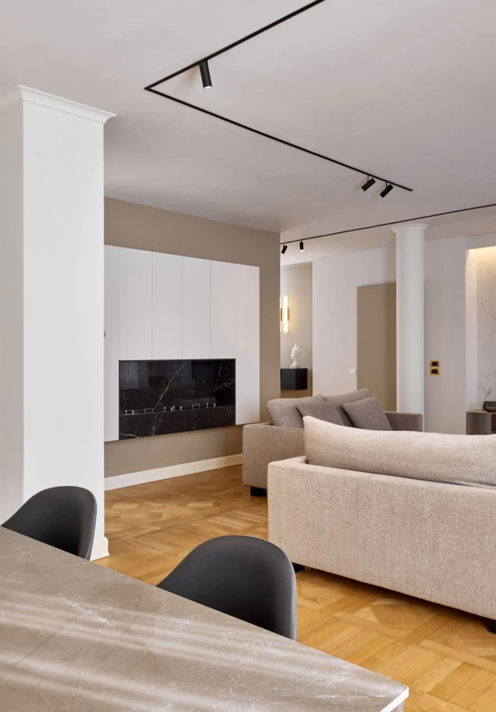 Proyecto zona sala de estar de Flussocreativo con grandes placas de gres Atlas Plan