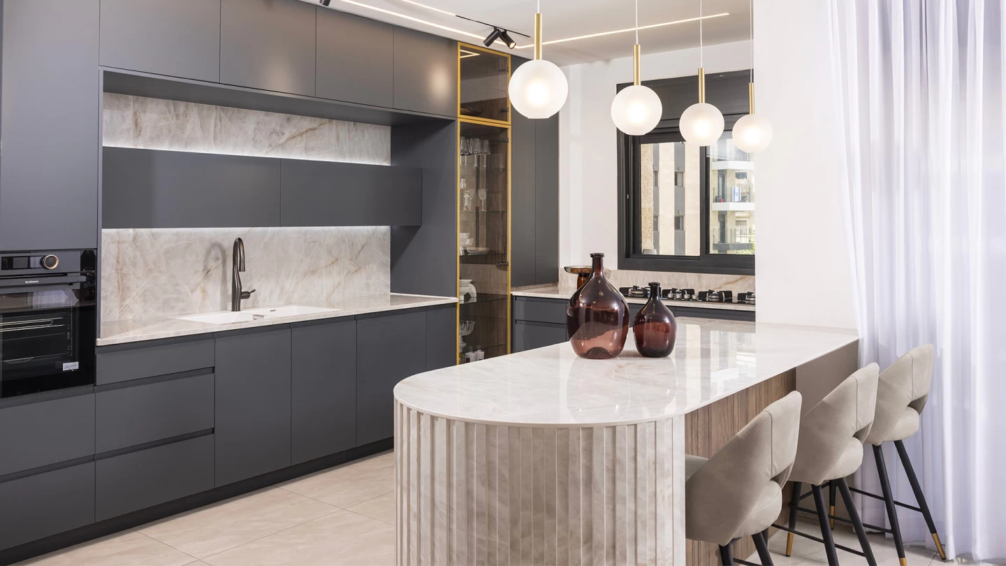 Modern minimalist kitchen with Atlas Plan Crystal White marble-effect porcelain tiles